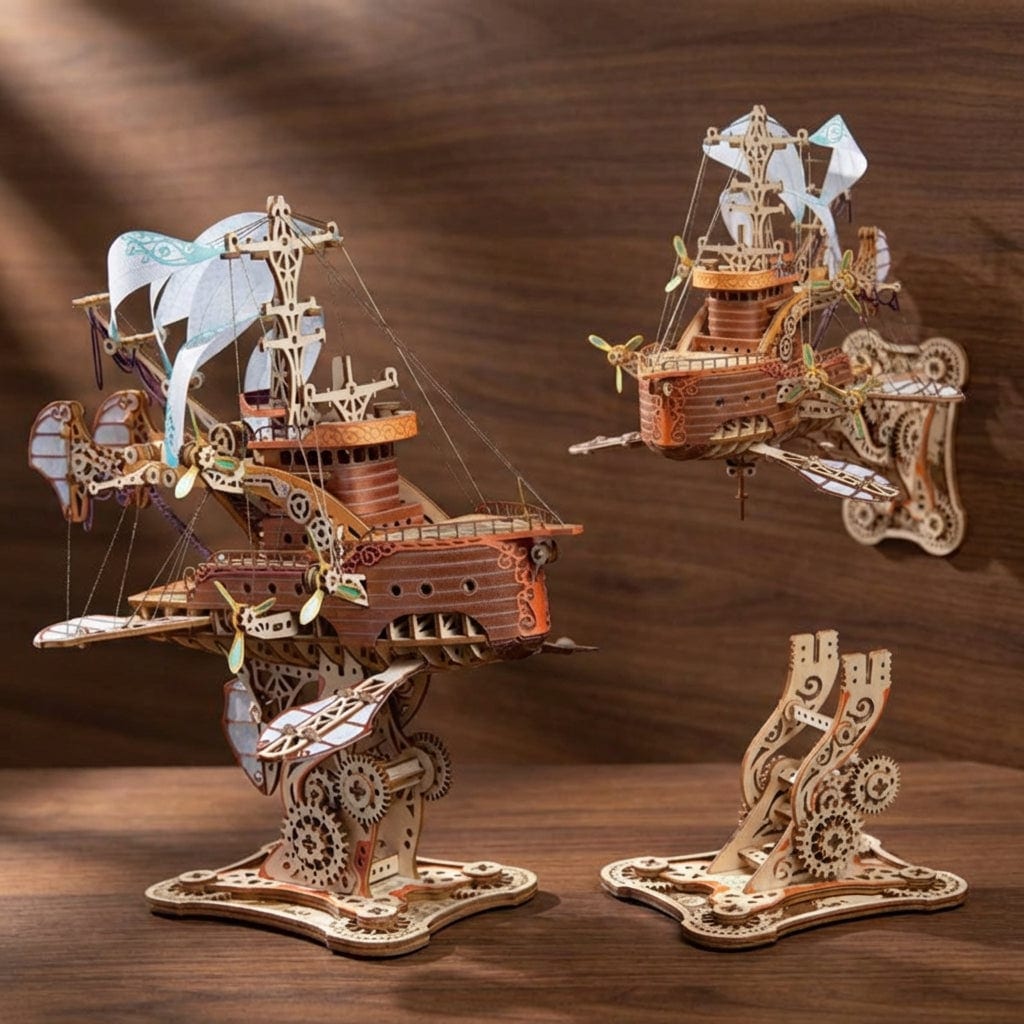 Puzzle 3D en bois d'un vaisseau spatial steampunk avec voiles et engrenages sur un socle. -vue 5