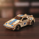 Puzzle 3D de voiture de course blanche avec détails bleus et noirs.