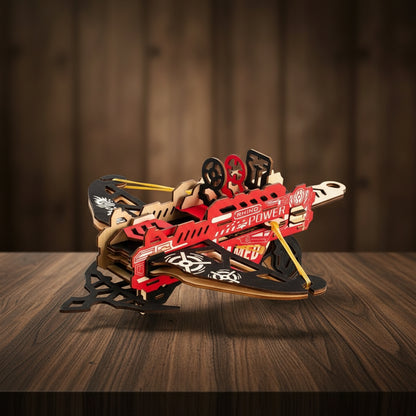 Puzzle 3D en bois représentant une arbalète rouge et noire avec inscriptions "RHINO POWER" et "AR...