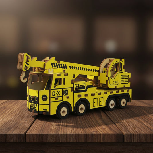Puzzle 3D d'un camion-grue jaune avec grue articulée et marquages 'D-X' 'C100'.