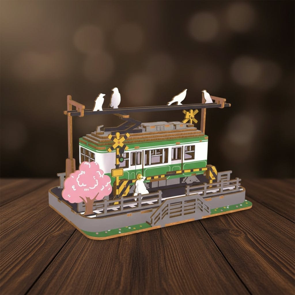 Puzzle 3D en bois de tramway avec personnages et arbres roses.