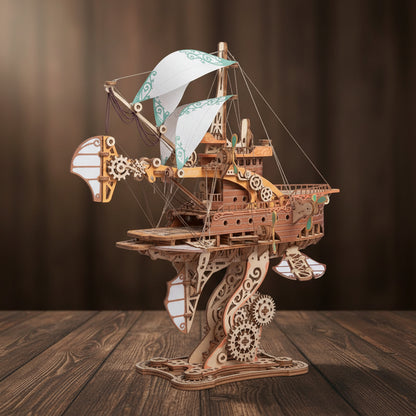 Puzzle 3D en bois d'un vaisseau spatial steampunk avec voiles et engrenages sur un socle. - vue 4