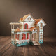Puzzle 3D de villa victorienne en bois blanche, bleue et rouge avec balcons et pignons.