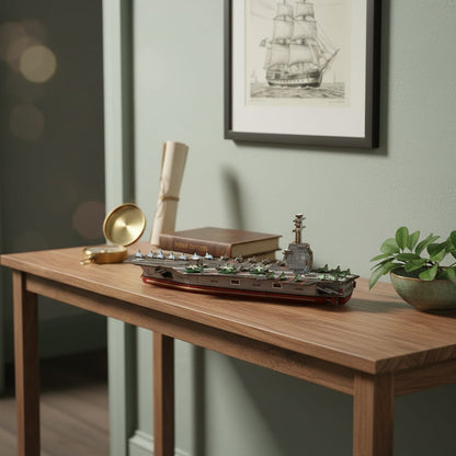 Puzzle 3D du Bateau USS CVN-78, posé sur une commode dans un intérieur design
